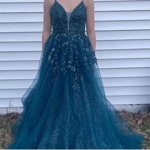 Stacees “peacock” prom gown.